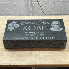 Sacred Devotion - Black Granite Headstone Memorial Marker with Crucifix and Floral Tribute Design